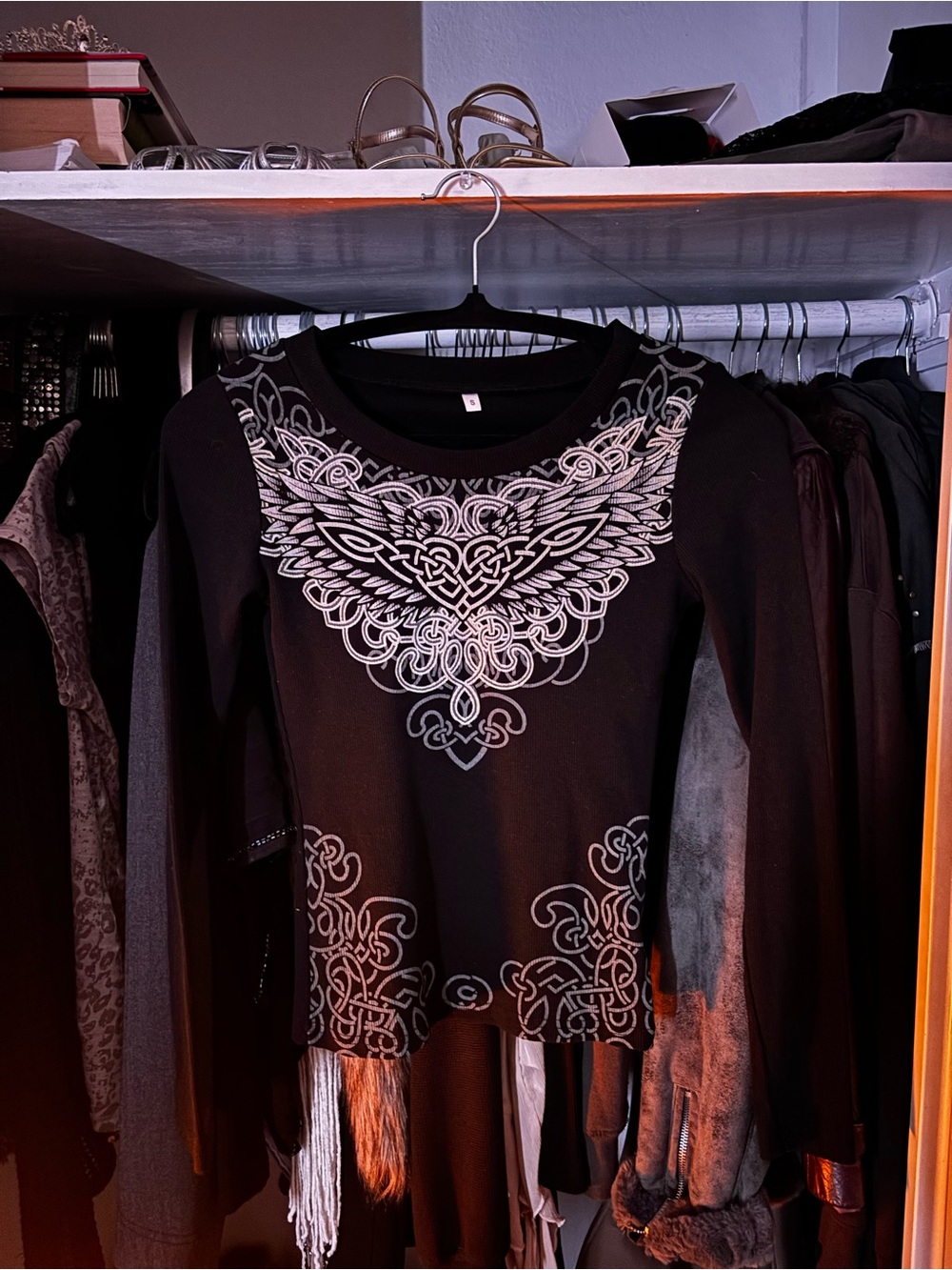 Black Long-Sleeve Top with Intricate White and Grey Celtic Print